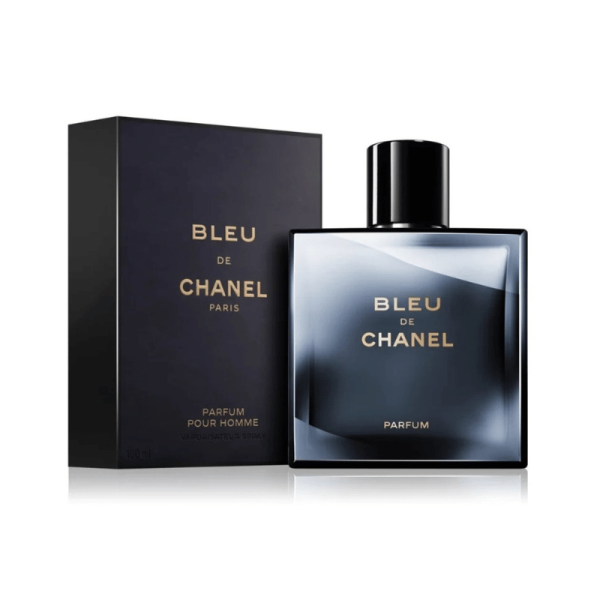 A 100ml bottle of Bleu de Chanel Parfum for men next to its dark blue and black box against a white background.