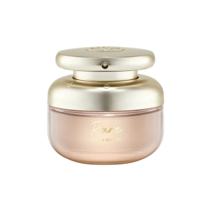 A pink and gold bottle of Rare Beauty Rare perfume on a white background.