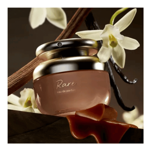 A bottle of Rare Beauty Rare perfume with vanilla pods, caramel, and flowers.
